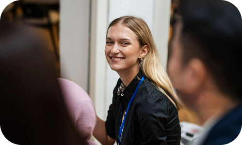 New Zealand female engineer smiling during a team meeting