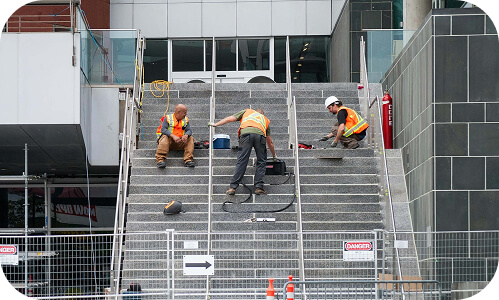 New Zealand material engineers working on concrete stairs